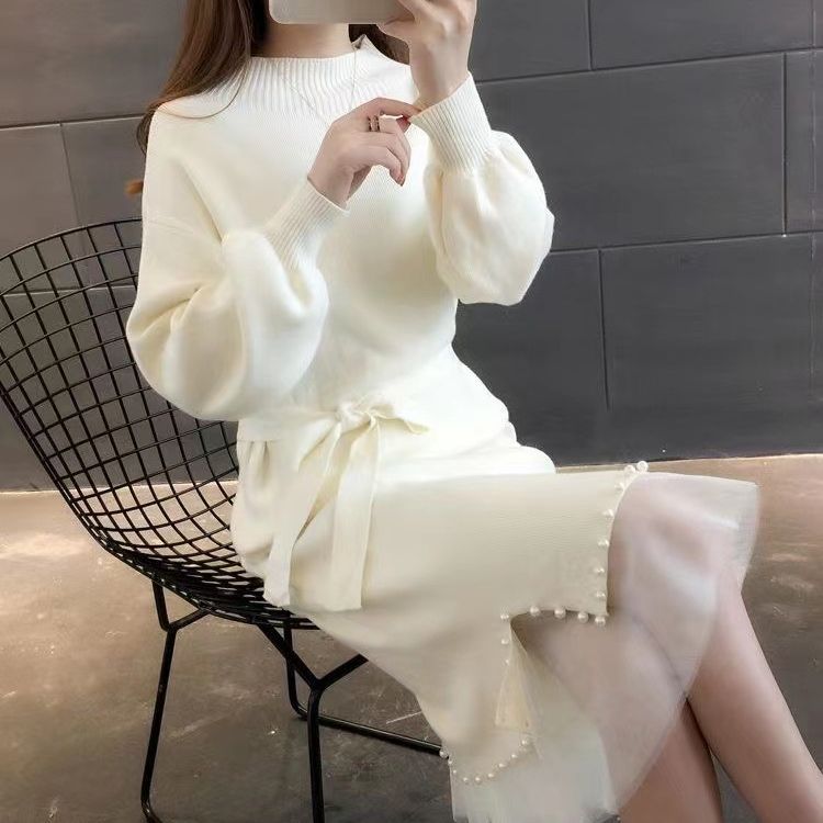 Robe tricotée élégante pour femmes avec ceinture à la taille et ourlet décoratif Chic und Stil