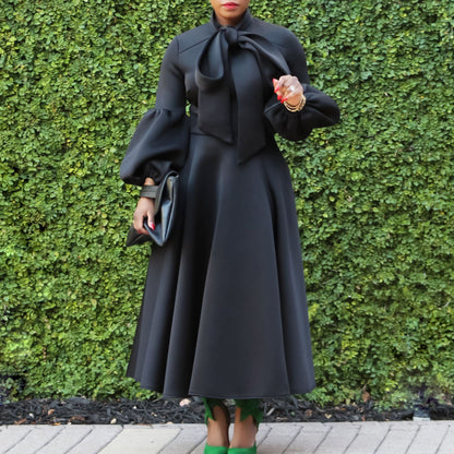 Robe midi pour dames avec col à nouer et manches volumineuses Chic und Stil