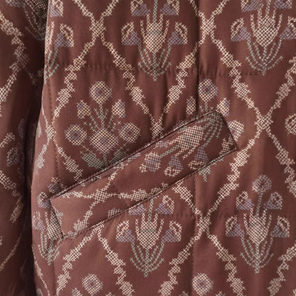 Quilted transitional jacket for women with floral design and practical pockets Chic and Style