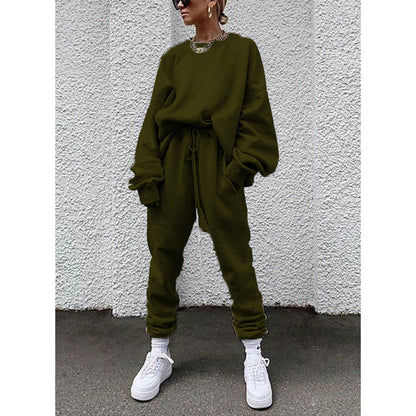 Women casual and comfortable leisure set with an oversized sweater and chic jogging pants and style