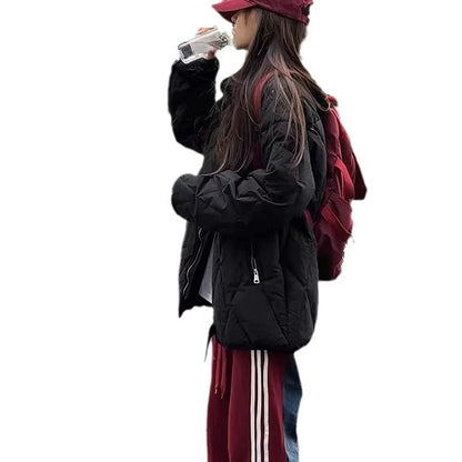 Functional quilted jacket for women with high collar and practical pockets Chic and Style