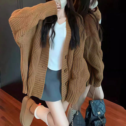 Dames gros tricot cardigan avec des manches surdimensionnées et de grands détails de bouton Chic und Stil