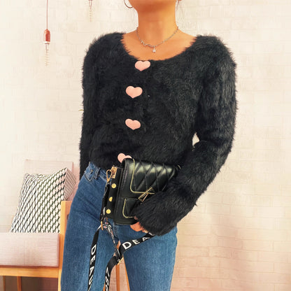 Pull en tricot confortable pour femmes avec boutons en forme de cœur Chic und Stil
