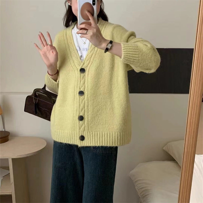 Dames Pull-over en tricot confortable avec un élégant décolleté en V et des détails de bouton Chic und Stil