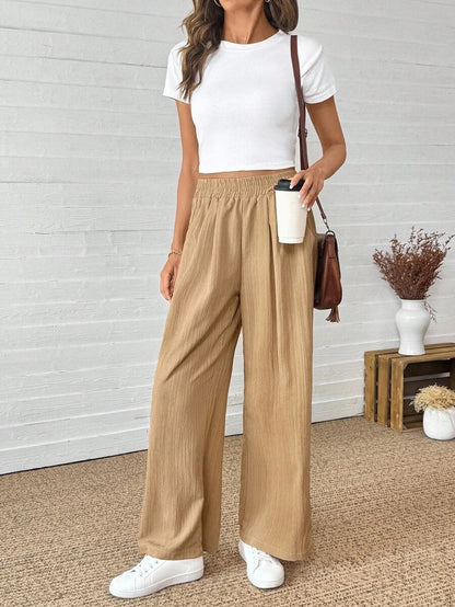 Wide pleated pants for women with elastic waistband and side pockets Chic and Style