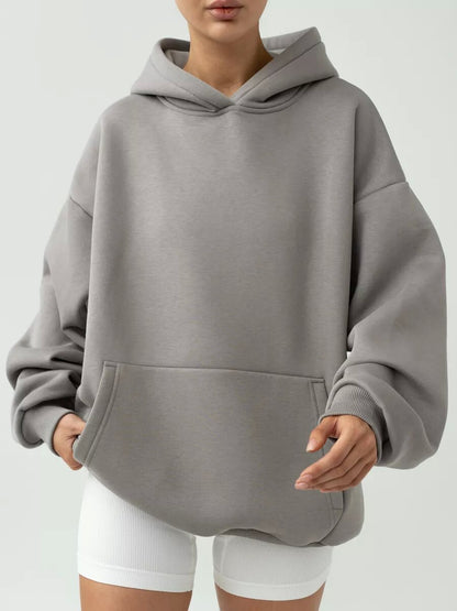 Dames Hoodie surdimensionné avec un design de poches kangourou pratique Chic und Stil