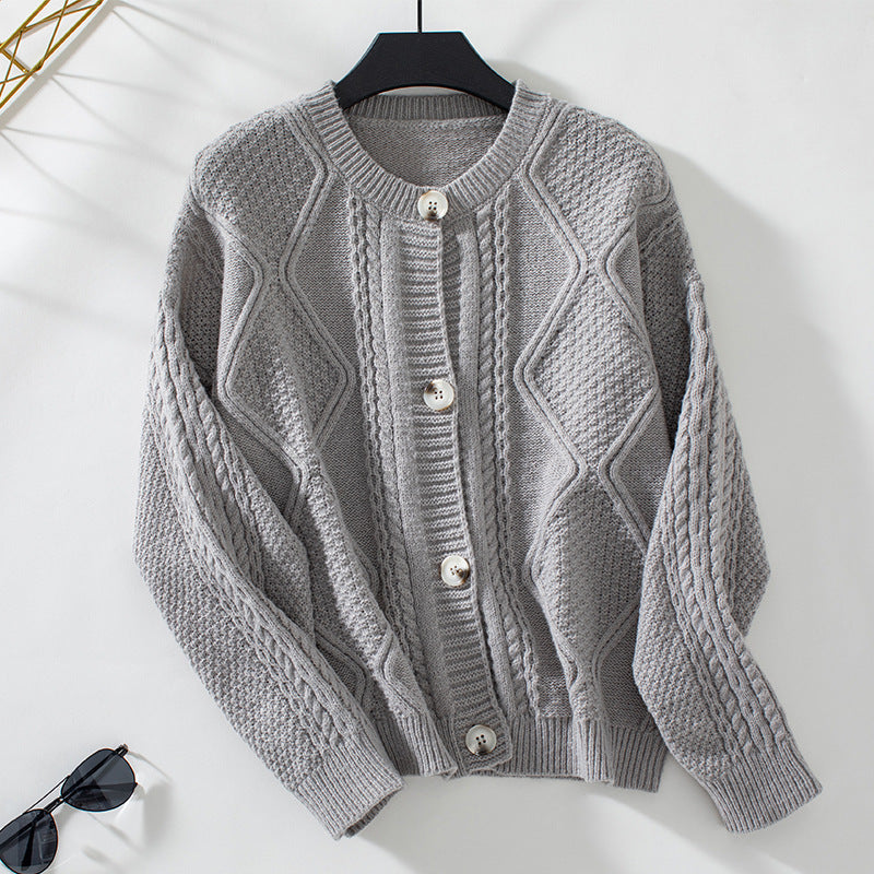 Veste en tricot pour femmes avec structure décorative et boutons Chic und Stil