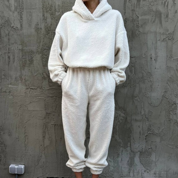 Women's comfortable fleece jumpsuit with elasticated waist and hood Chic und Stil