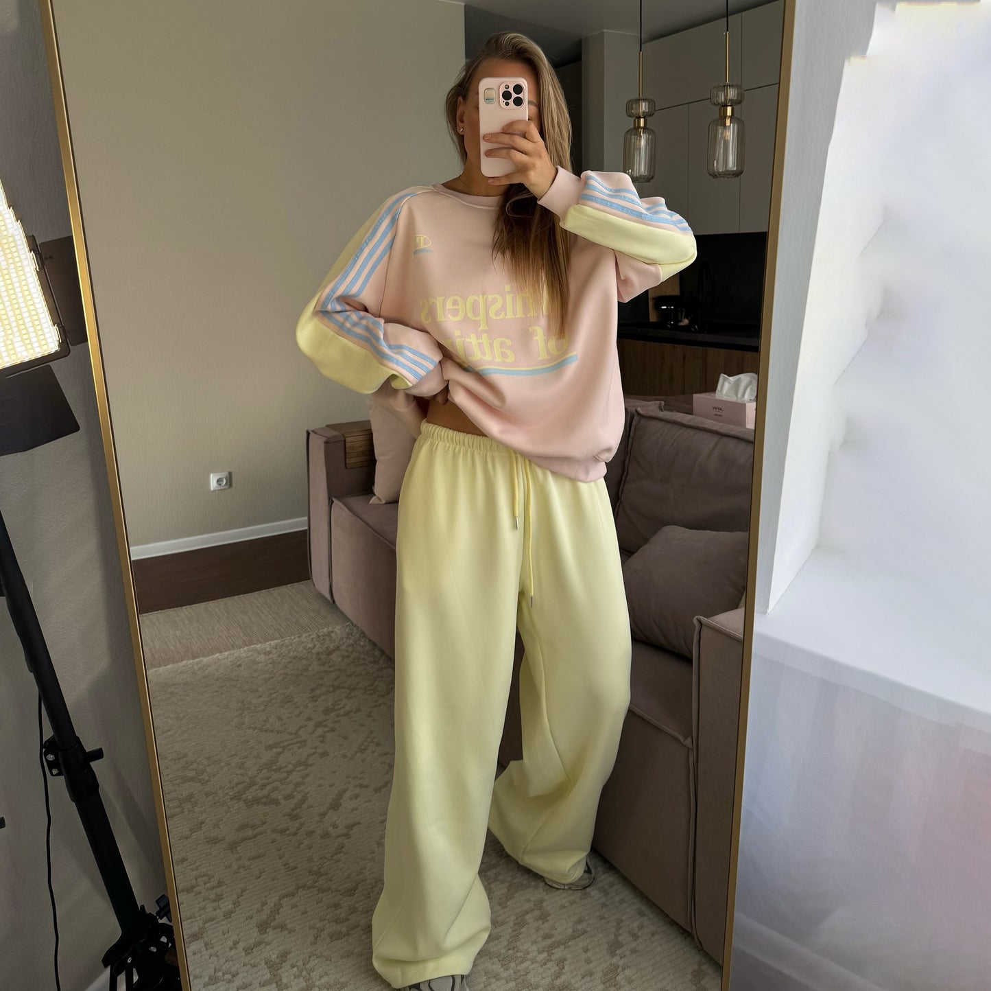 Ladies Casual Sports Outfit with a Relaxed Sweatshirt and Comfortable Jogging Pants Chic and Style