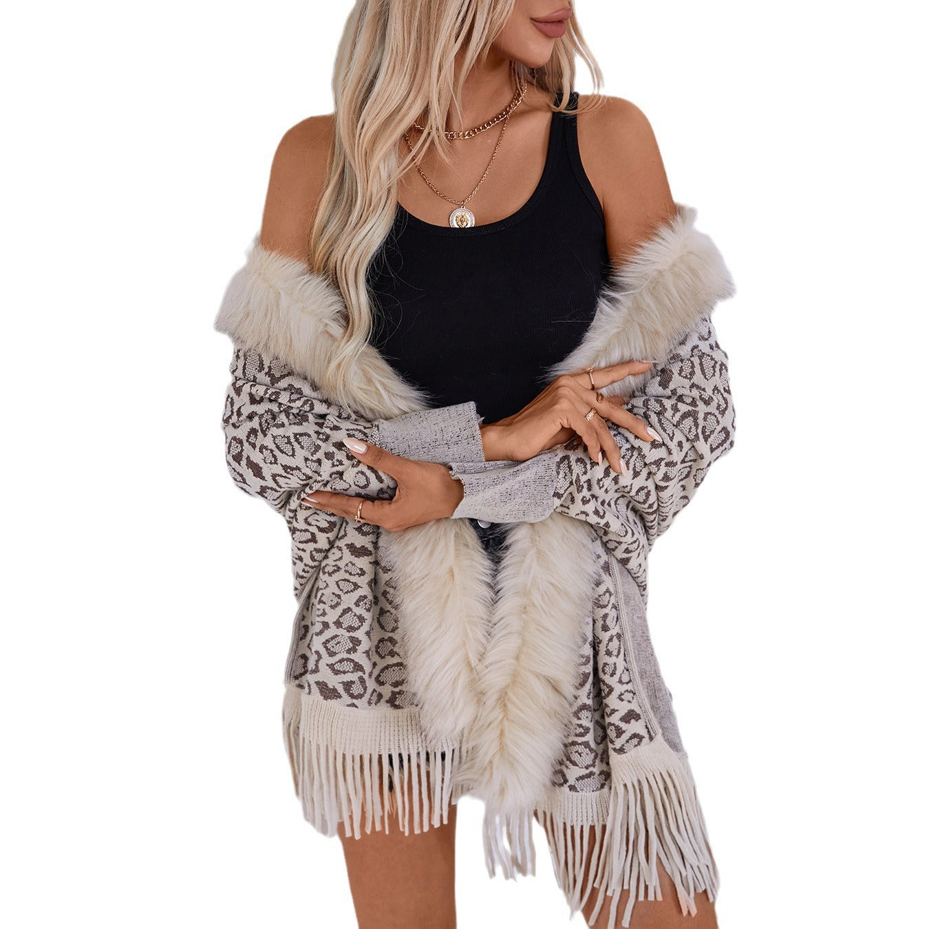 Dames élégant pull poncho avec un col en fausse fourrure luxueux et un ourlet à franges Chic und Stil