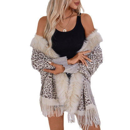 Dames élégant pull poncho avec un col en fausse fourrure luxueux et un ourlet à franges Chic und Stil