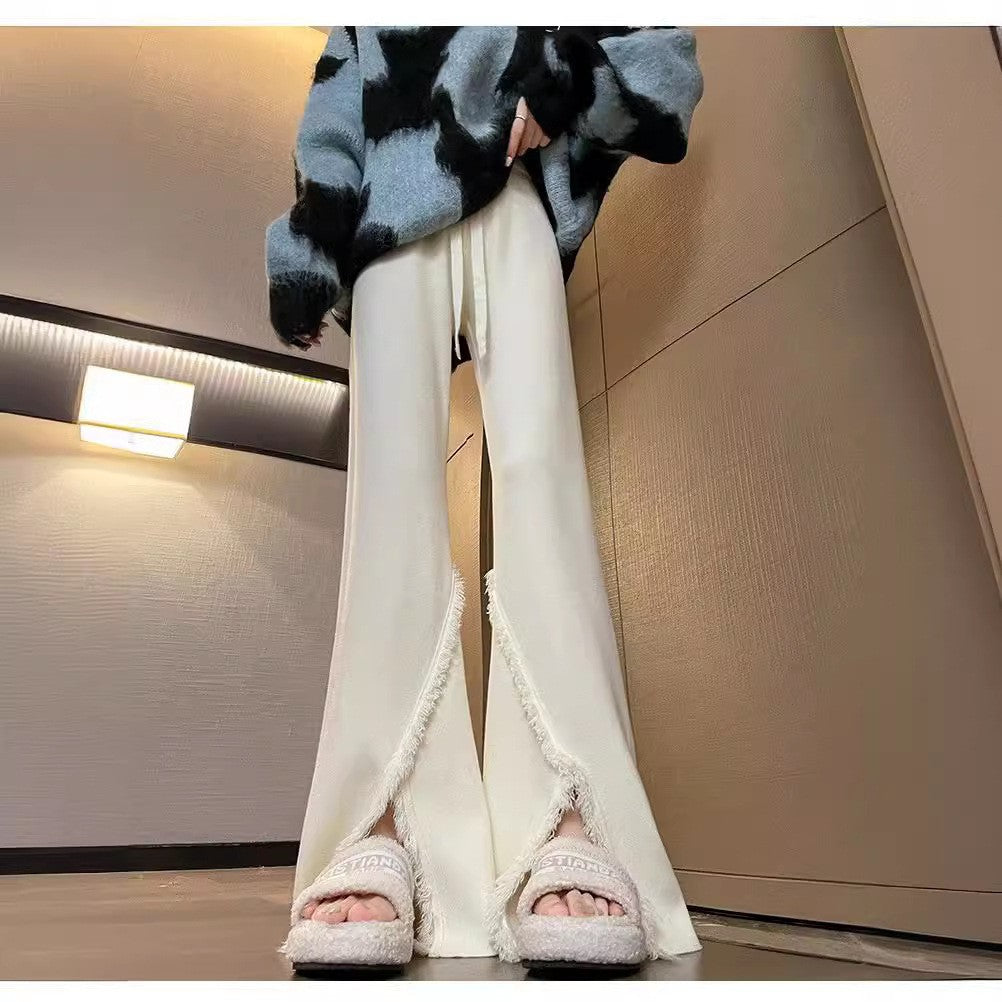 Ladies Elegant Pants with High Side Slits and Chic Fringed Finishes and Style