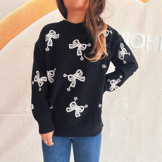 Pull femme avec motif de nœud ludique et coupe décontractée Chic und Stil