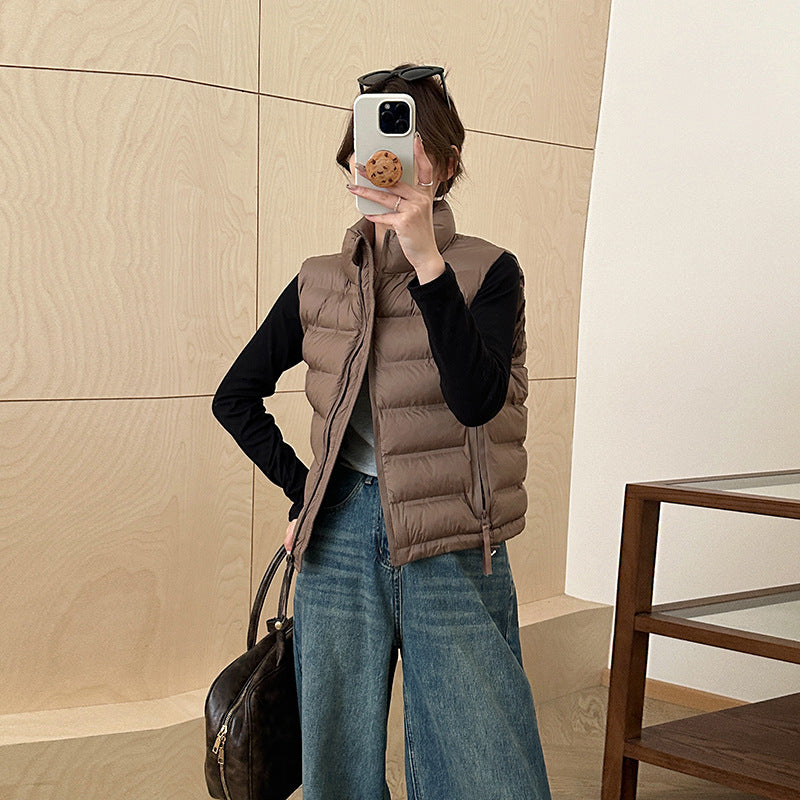 Dames gilet matelassé avec cordon de taille ajustable et poches pratiques Chic und Stil