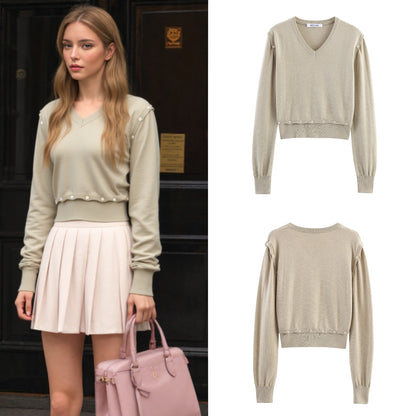 Pull court à la mode pour femmes avec détails de boutons Chic und Stil