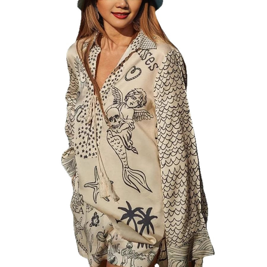 Chemisier de plage décontracté pour femmes avec un imprimé maritime artistique et un élégant décolleté en V Chic und Stil