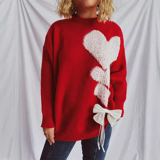 Pull femme avec design en forme de cœur et nœud décoratif Chic und Stil