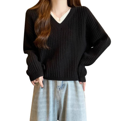 Pull condescendant à col en V pour femmes avec texture côtelée et cordons latéraux à la mode Chic und Stil