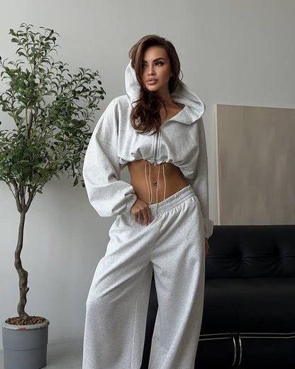Women's sports set with casual oversized hoodie and wide pants Chic and Style