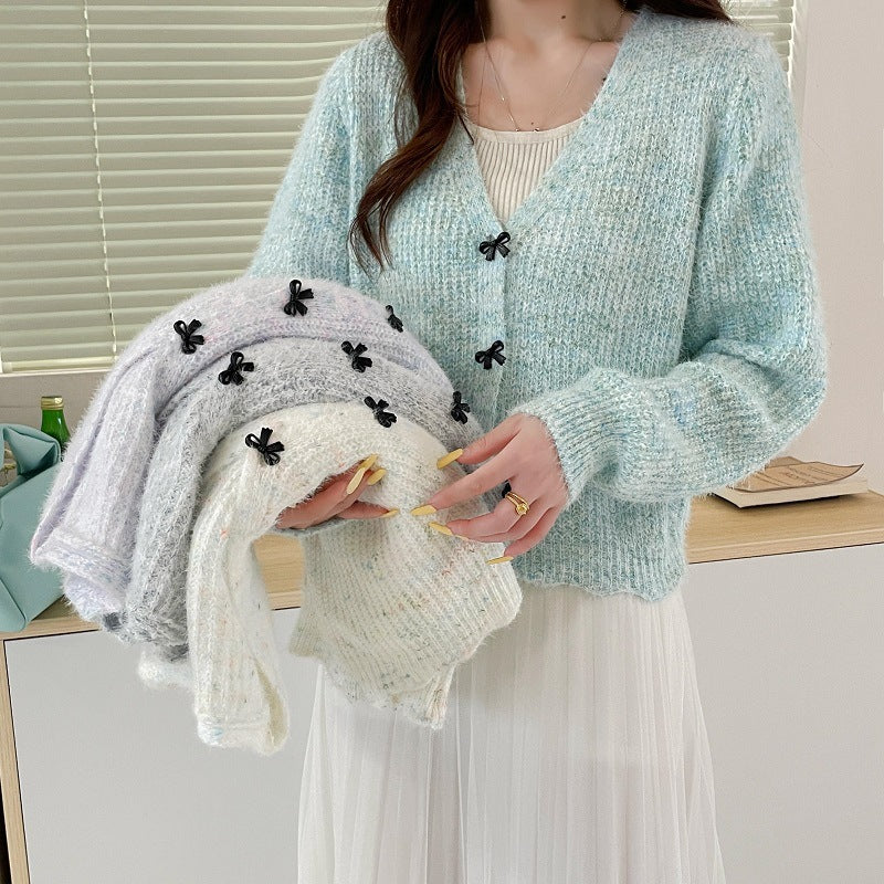 Dame cardigan avec décolleté en V et boutons décoratifs Chic und Stil