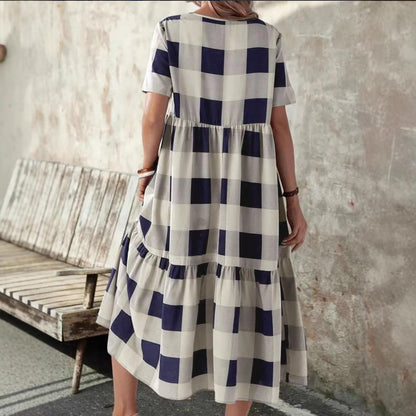 Robe longue à manches longues pour femmes avec un motif à carreaux à la mode et une coupe fluide Chic und Stil