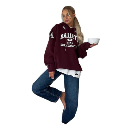Pull à capuche oversize pour femmes avec des détails de déchirure tendance Chic und Stil