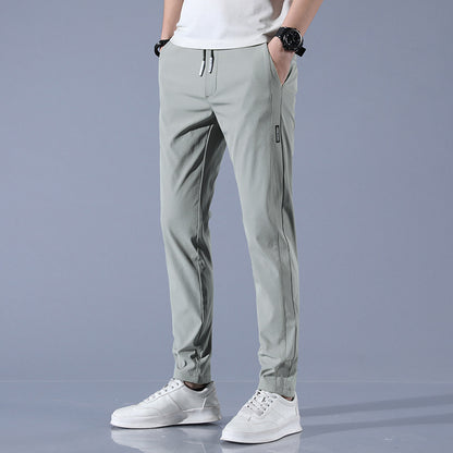 Men's sports pants with adjustable drawstring and zippered pockets on the sides Chic and Style