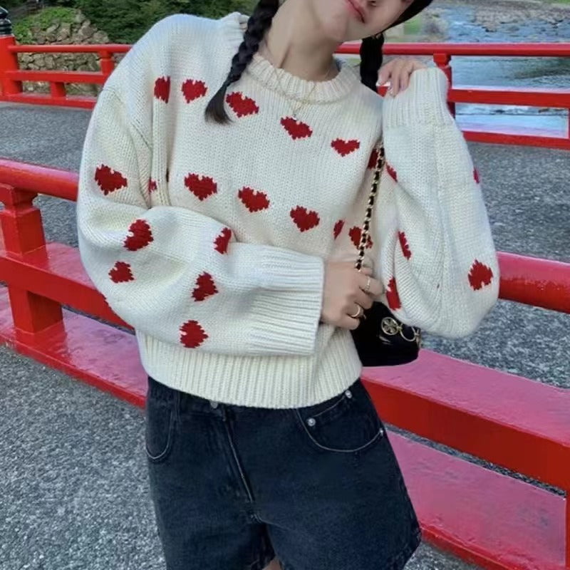 Pull femme avec motif en cœur et coupe décontractée Chic und Stil