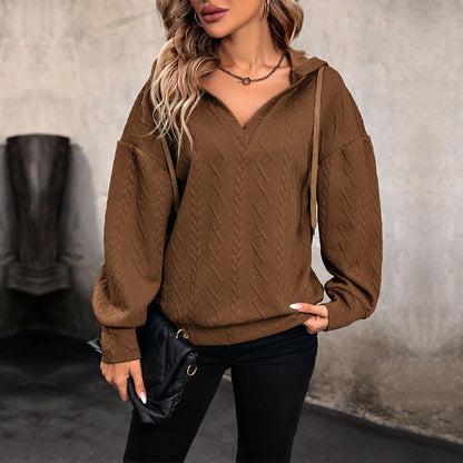 Pull femme avec capuche et design texturé Chic und Stil