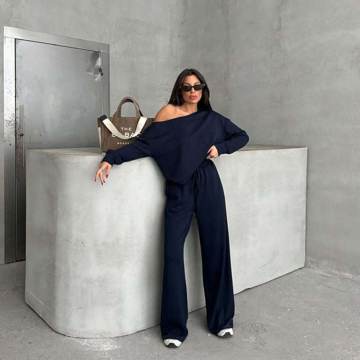 Combinaison décontractée pour femmes avec des jambes larges et un design off-shoulder Chic und Stil