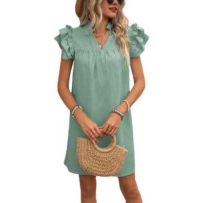 Robe élégante à manches courtes pour dames avec des détails en volants et décolleté en V Chic und Stil