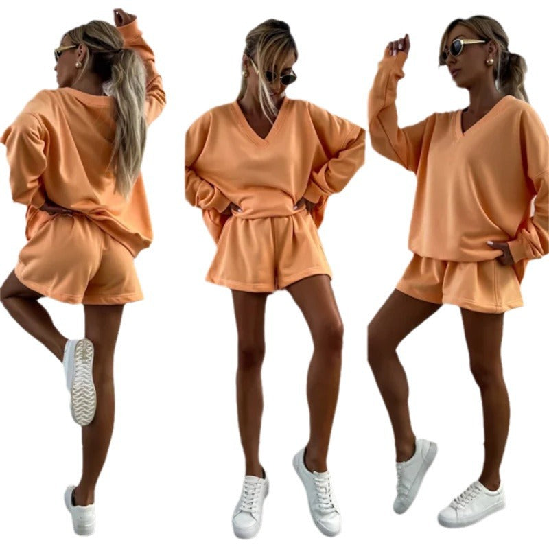 Casual outfit for women with oversized V-neck sweater and shorts Chic and Style