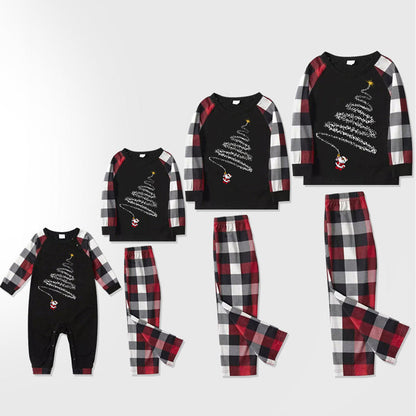 Chic und Stil | Christmas hat and 'Believe' letter print patterned check sleeves contrast tops and red & black & white check pants family pajama set with dog bandana