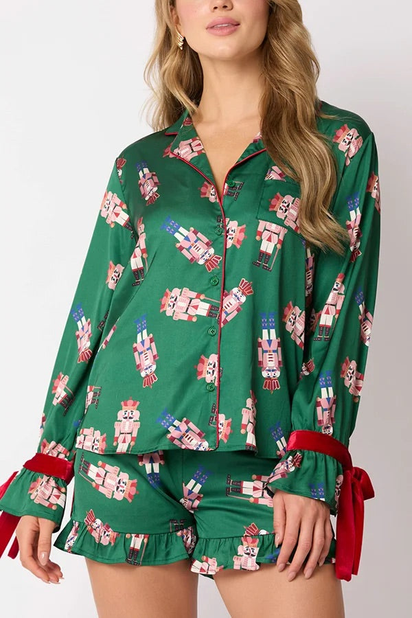 Chic und Stil | Christmas Fashion Printed Bow Tie Top and Elastic Waist Ruffled Shorts Set