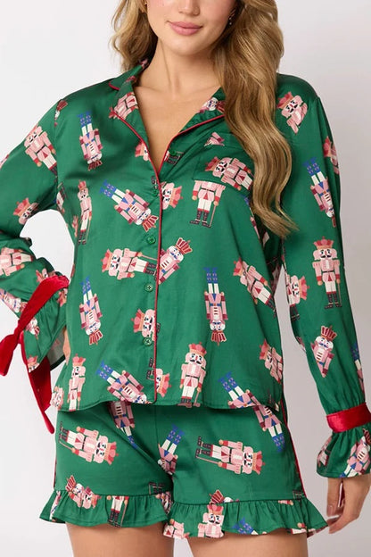 Chic und Stil | Christmas Fashion Printed Bow Tie Top and Elastic Waist Ruffled Shorts Set