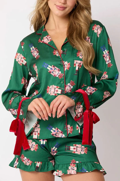 Chic und Stil | Christmas Fashion Printed Bow Tie Top and Elastic Waist Ruffled Shorts Set