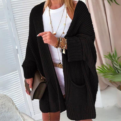 Chic und Stil | Pull-over à manches ouvertes surdimensionné avec poches avant